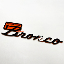 Bronco Wildtrak Fender Abzeichen Heckklappe Emblem 3D Abzeichen Schwarz gegen Orange
 3